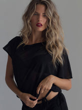 Black BRISA top by findmenowthelabel, featuring a stylish sleeveless design with a fitted silhouette and subtle neckline details.