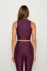 Black Luxe Edge leather-look crossover crop top from Fitkitty Culture Athleisure Wear, featuring a stylish, fitted design.