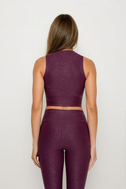Black Luxe Edge leather-look crossover crop top from Fitkitty Culture Athleisure Wear, featuring a stylish, fitted design.