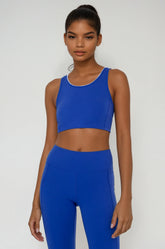 Blue Breathe Easy cut-out back sports bra by Fitkitty Culture, made with Lycra® blend, designed for active yoga and workout wear.