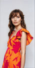 Vibrant Fire Floral high-low maxi dress by Fitkitty Culture Athleisure Wear, featuring colorful floral pattern and flowing design.