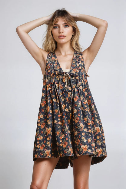 Vintage Bloom Denim Romper by Fitkitty Culture features a stylish, casual denim design perfect for relaxed, trendy women&