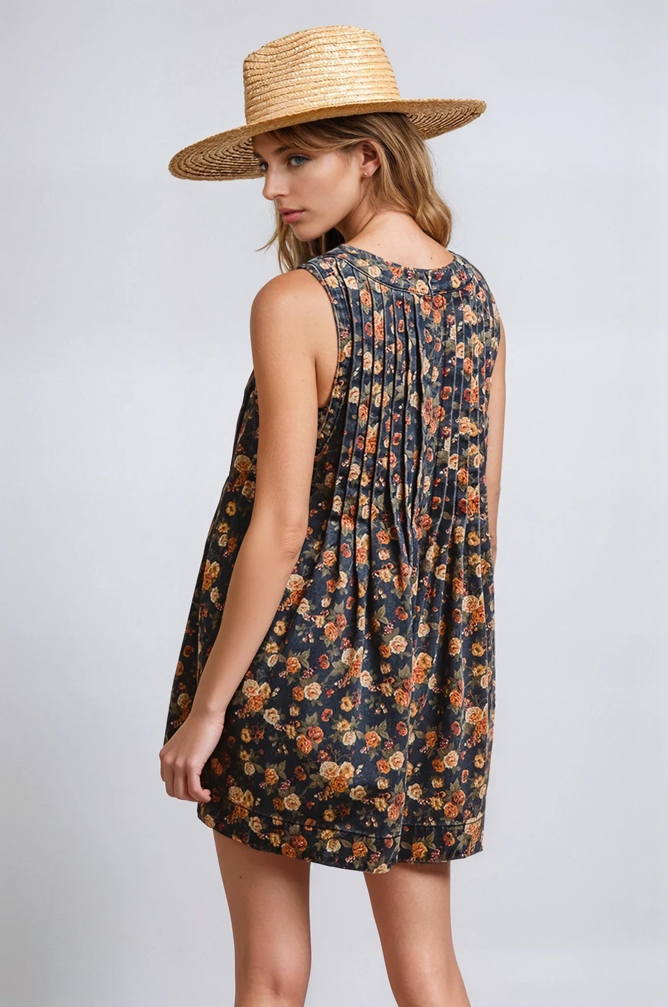 Vintage Bloom denim romper from Fitkitty Culture featuring a casual, sleeveless design with floral embroidery and adjustable straps.
