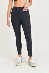 Black Joystar high waist leggings by Fitkitty Culture for yoga and athleisure, shown on a model in a fitness setting.