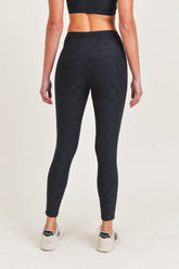 Black high waist leggings by Fitkitty Culture Athleisure Wear, featuring a snug fit and stretchy fabric for active and casual wear.