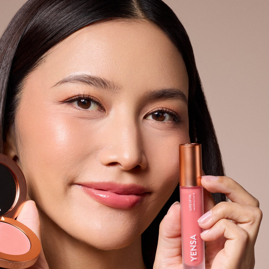 YENSA Luxe Lip Nourishing Oil with Hyaluronic and Vitamin E, showing a sleek lip oil bottle on a white background.