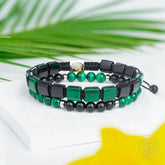 Jewelry set featuring bracelets from Conscious Items with symbolic charms for mental healing and emotional well-being.