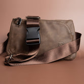 Shield Your Body SYB Cross Body Fanny Pack in brown vegan leather, stylish mobile phone accessory with adjustable strap.