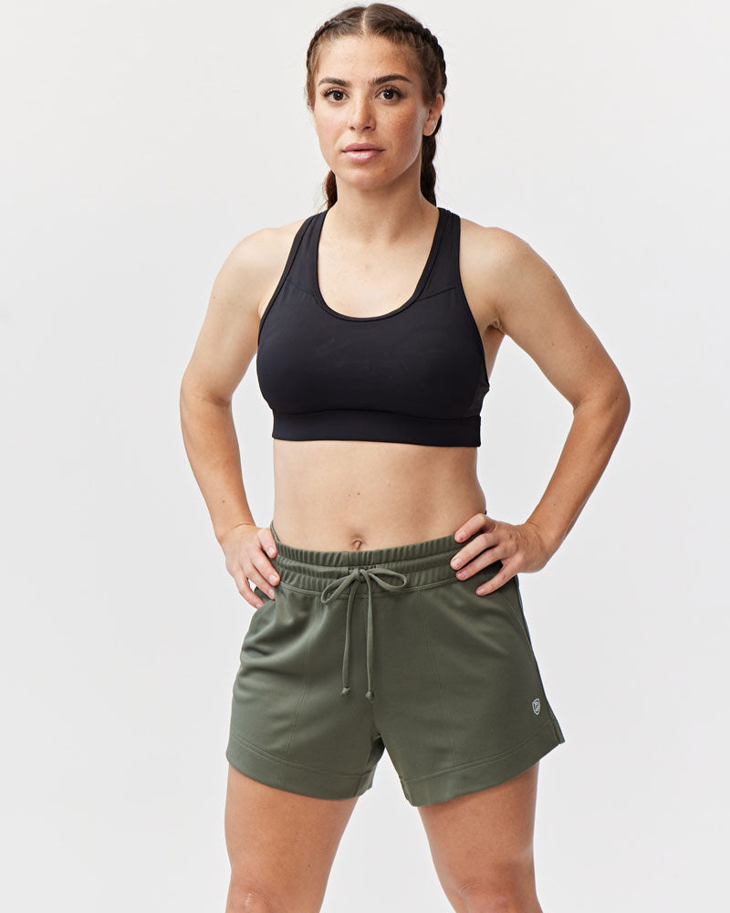 Dark moss green Goal Five G5 Advance 4.5-inch knit shorts displayed on a model, featuring a comfortable fit and stylish design.