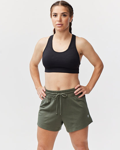 Dark moss green Goal Five G5 Advance 4.5-inch knit shorts displayed on a model, featuring a comfortable fit and stylish design.