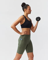 Dark moss Goal Five Go Again Bike Short 8-inch training shorts with stretch fabric and athletic fit.