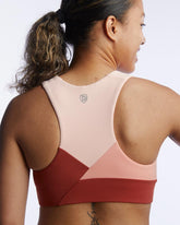 Goal Five Pionxr training bra top in rose cinnabar color, stretchy athletic crop top for workouts and activewear.