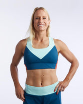 Goal Five Pionxr Training Bra Top in rose cinnabar color, shown on a model, designed for activewear and sports training.