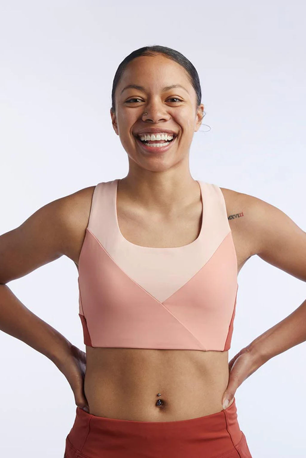 Goal Five Pionxr Training Bra Top in rose cinnabar color, shown on a model, designed for comfort and support during workouts.