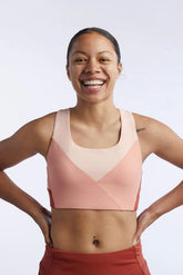 Goal Five Pionxr Training Bra Top in rose cinnabar color, shown on a model, designed for comfort and support during workouts.