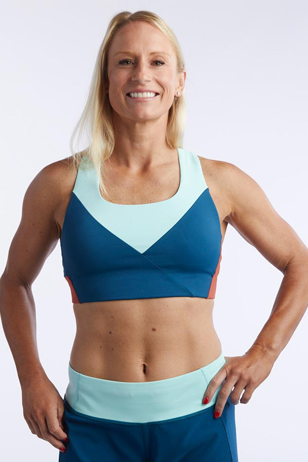 Goal Five Pionxr Training Bra Top in rose cinnabar nectar, front view showing soft fabric and supportive fit.