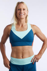 Goal Five Pionxr Training Bra Top in rose cinnabar nectar, front view showing soft fabric and supportive fit.