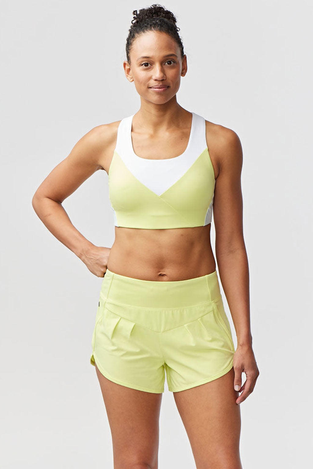 Goal Five Pionxr training bra top in rose cinnabar nectar color, shown in XS size on a model.