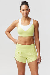 Goal Five Pionxr training bra top in rose cinnabar nectar color, shown in XS size on a model.