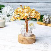 Golden Lamp of Wealth Citrine Tree night light by Conscious Items, featuring a shimmering gold design with a citrine gemstone centerpiece.