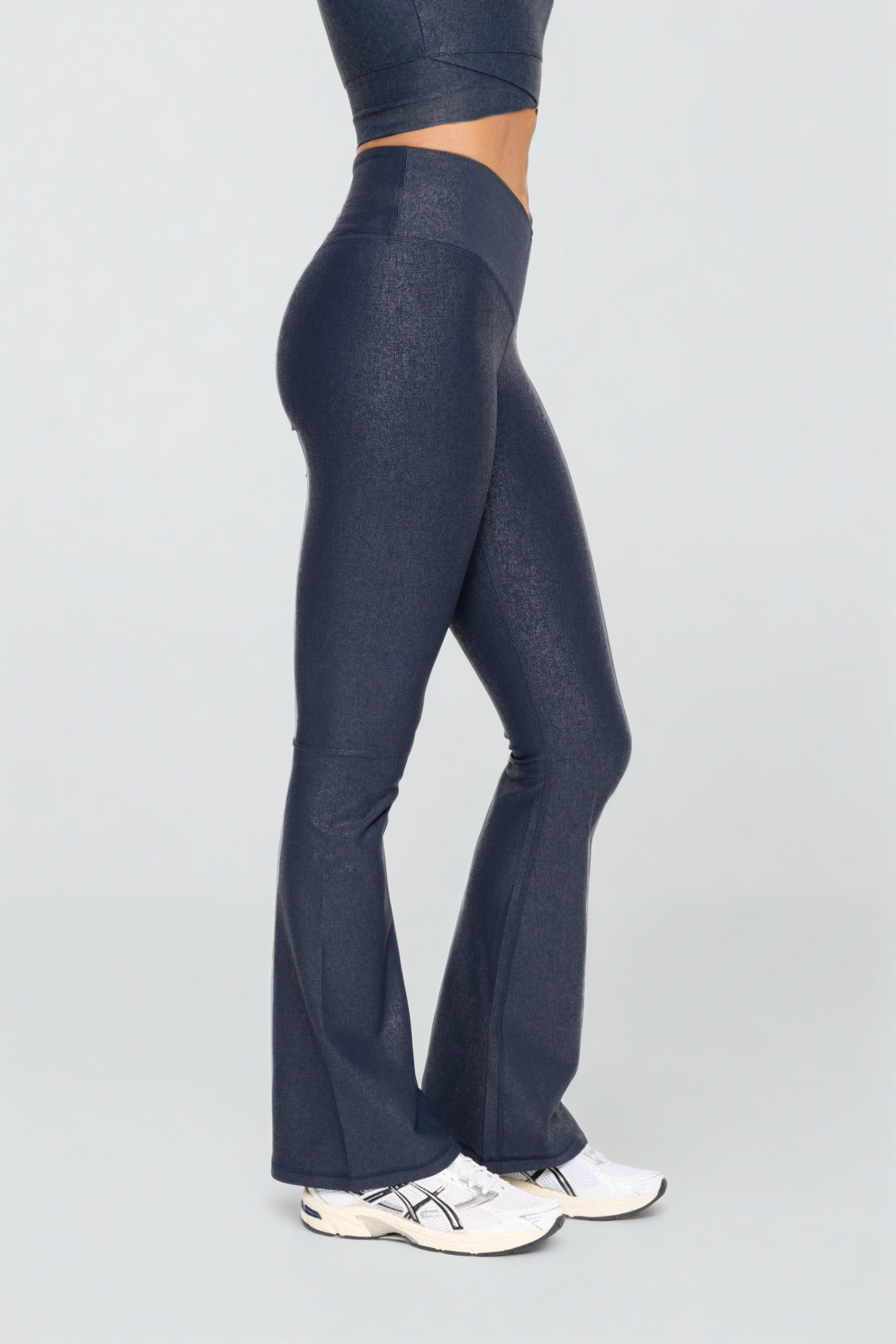 Luxe Edge leather-look crossover flare leggings from Fitkitty Culture Athleisure Wear, featuring a stylish high waist and flare design.