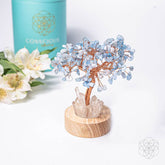 Aquamarine Tree Guardian Angel Protection Night Light by Conscious Items, featuring a detailed angel and aquamarine resin tree.
