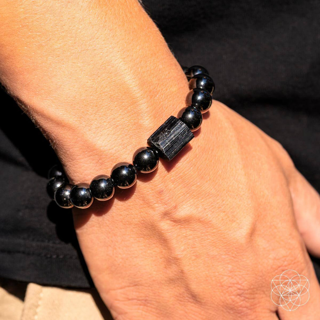 Black Obsidian and Tourmaline bracelet by Conscious Items featuring polished beads for stylish, spiritual jewelry.