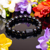 Black Obsidian and Tourmaline bracelet from Conscious Items, featuring smooth beads and a stylish design for positive energy.