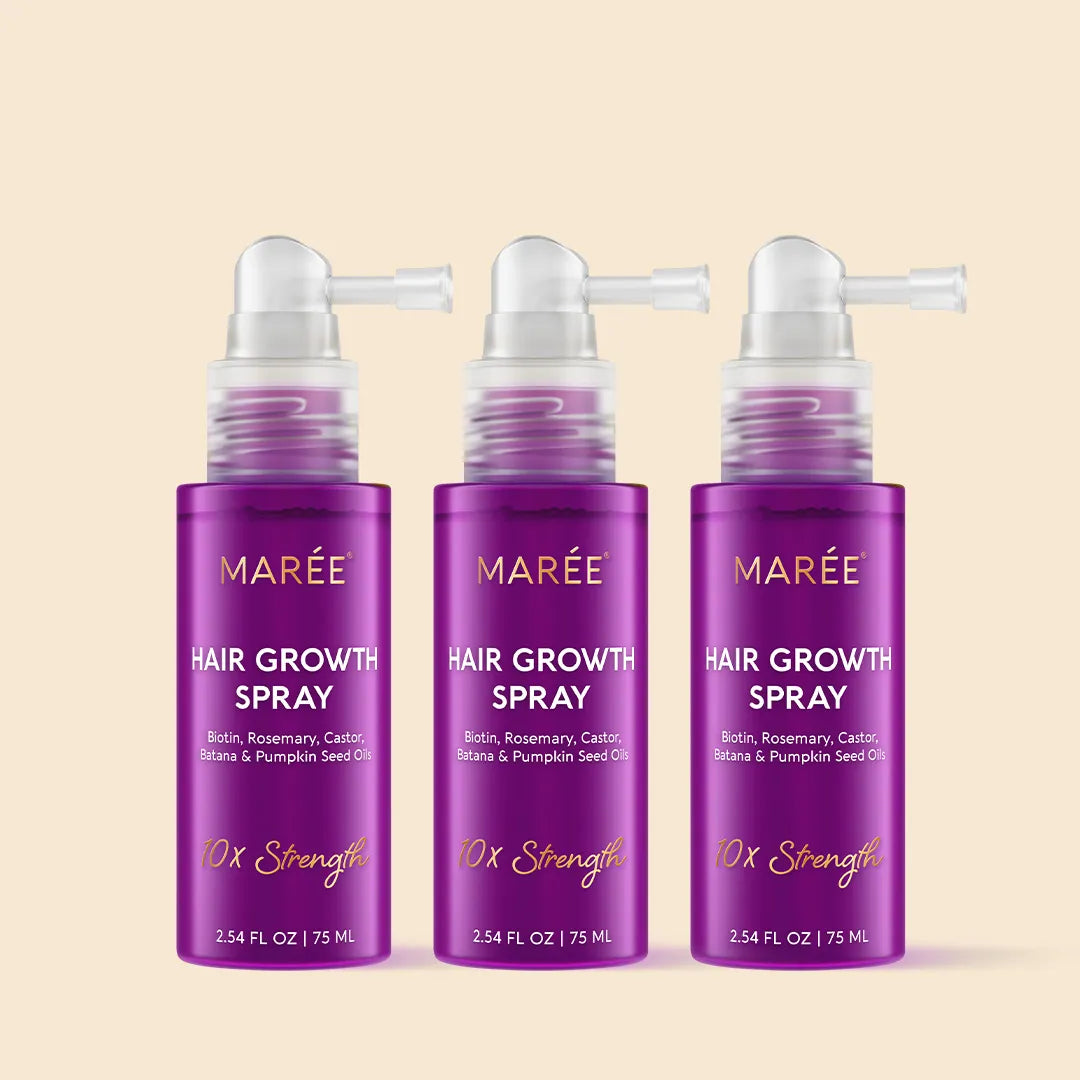 Maree 4-in-1 Hair Growth Spray bottle with spray nozzle, designed to promote hair growth and strengthen hair strands.