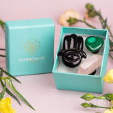 Hamsa Hand of Safe Travels aromatherapy crystal car kit by Conscious Items, featuring a crystal set with a Hamsa hand charm for protection.