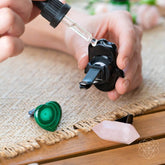 Hamsa Hand of Safe Travels aromatherapy crystal car kit by Conscious Items, featuring a set of calming crystals for travel protection.