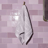 Italic Capri Australian Cotton hand towel for home bath, soft and absorbent white cotton towel with textured weave.