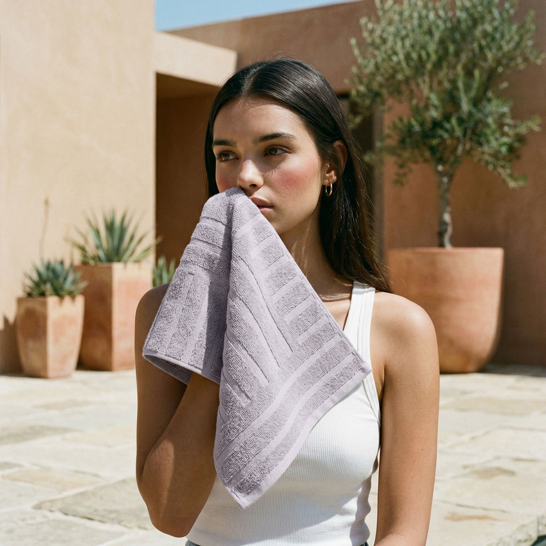 Italic Capri Australian Cotton Hand Towel for home bath, soft and absorbent cotton fabric, shown folded on a clean bathroom surface.