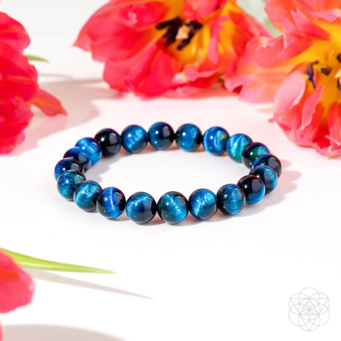 Royal blue tiger’s eye bracelet by Conscious Items featuring a beaded design and a sleek, polished finish.