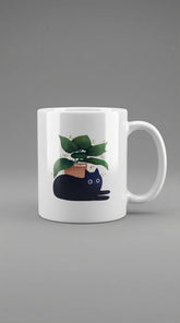 Yūjin Clothing chilling cat mug with a relaxed cat design, ceramic mug perfect for coffee or tea.