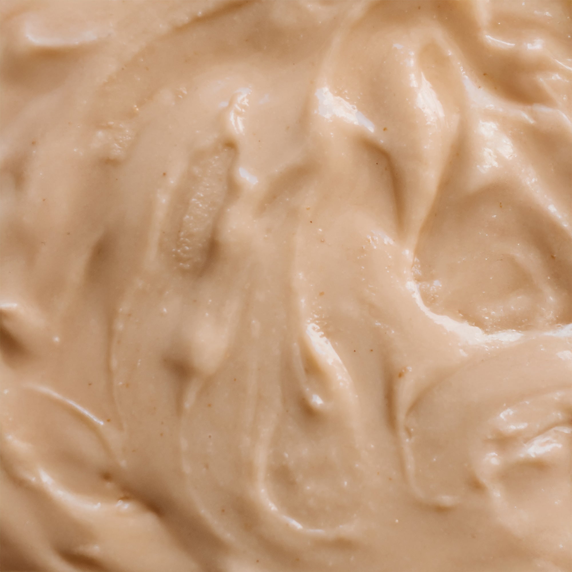 House of Macadamias sea salt macadamia nut butter jar, creamy spread with visible nut pieces and sea salt crystals on top.