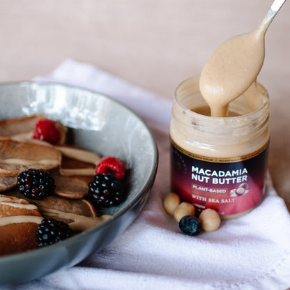 House of Macadamias Sea Salt Macadamia Nut Butter jar with label, showcasing creamy nut butter with sea salt flavor.