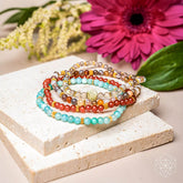 Set of four Conscious Items I Am Healthy bracelets for mind, body, and spirit restoration, featuring colorful beaded designs.