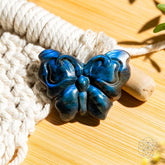 Labradorite crystal heart carving of transformation by Conscious Items, showcasing iridescent shimmer and detailed craftsmanship.