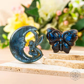 Labradorite crystal heart carving titled "I Am Reborn" by Conscious Items, symbolizing transformation and renewal.
