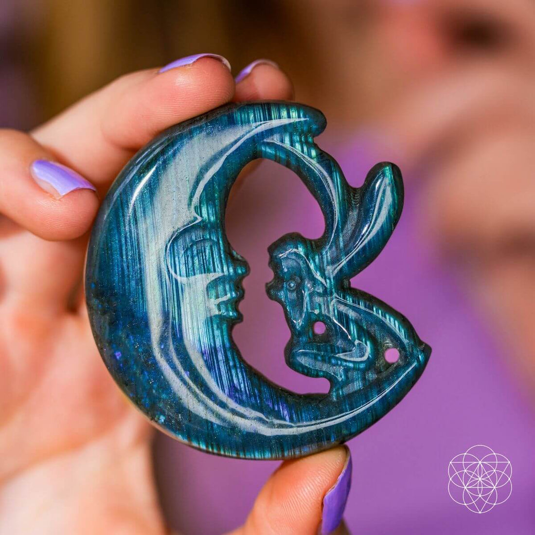 Labradorite crystal heart carving titled "I Am Reborn" by Conscious Items, symbolizing transformation and renewal.