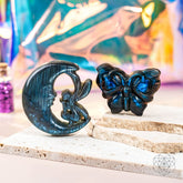 Labradorite crystal heart carving titled "I Am Reborn" by Conscious Items, symbolizing transformation and renewal.