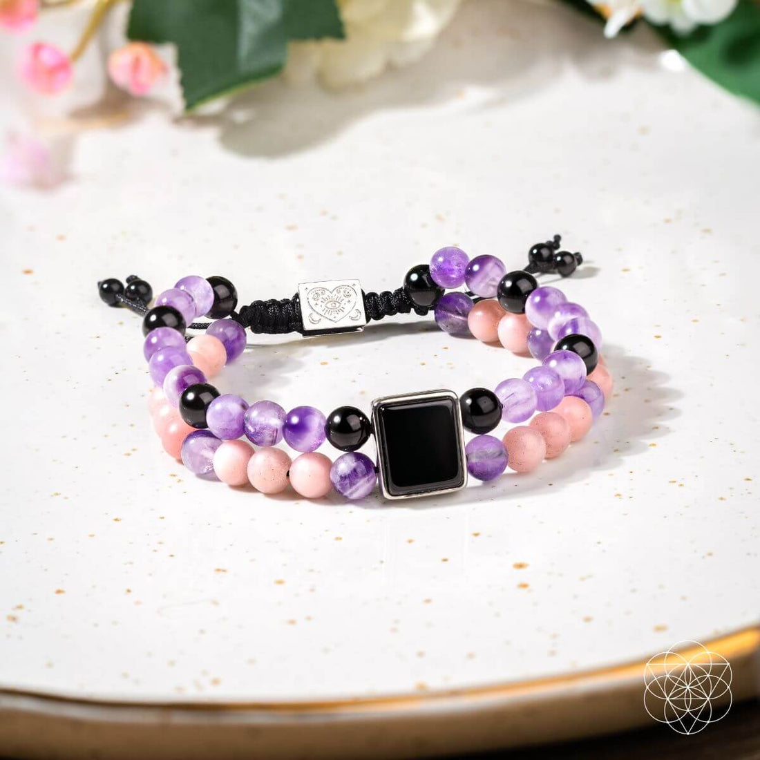 Jewelry set featuring the I Am Strong illuminating bracelet of feminine power by Conscious Items, showcasing a glowing, empowering design.