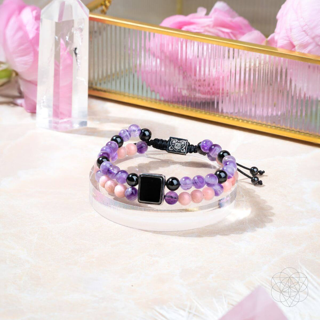 Jewelry set featuring the I Am Strong illuminating bracelet of feminine power by Conscious Items, showcasing a glowing, empowering design.