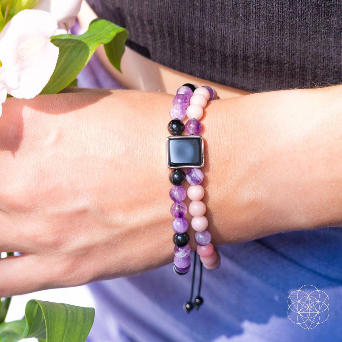 Jewelry set featuring the I Am Strong illuminating bracelet of feminine power by Conscious Items, showcasing a glowing, empowering design.