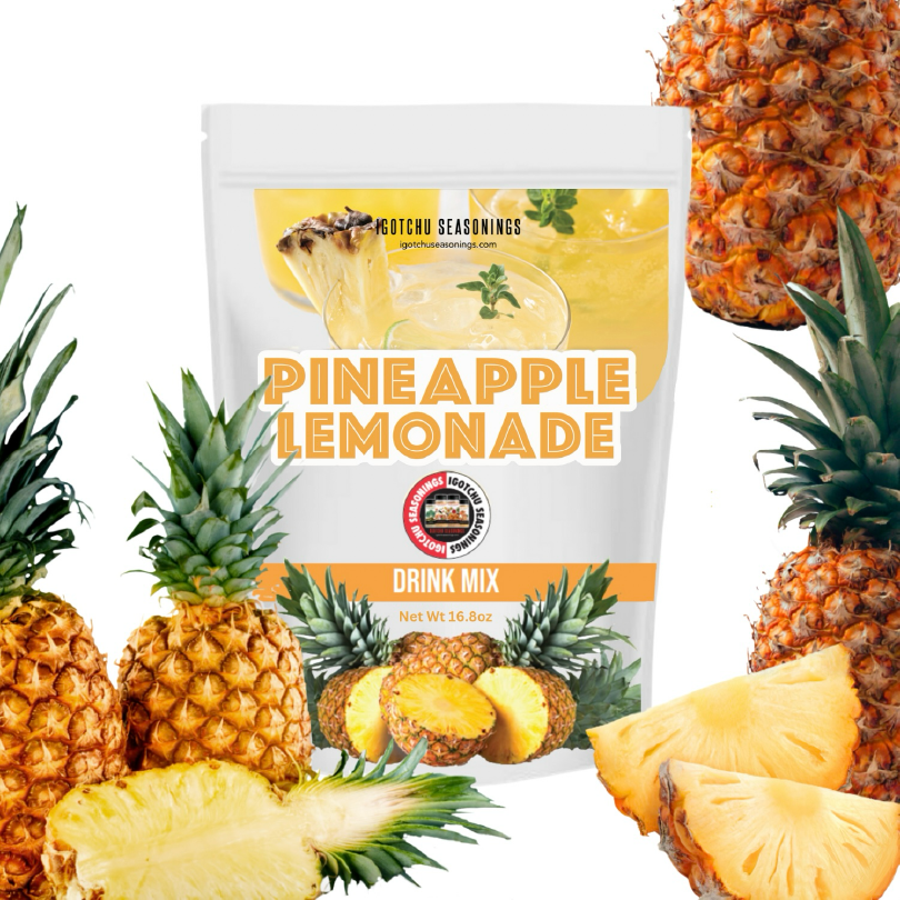 Igotchu Pineapple Lemonade juice in a clear glass with fresh pineapple and lemon slices, showcasing a refreshing tropical beverage.