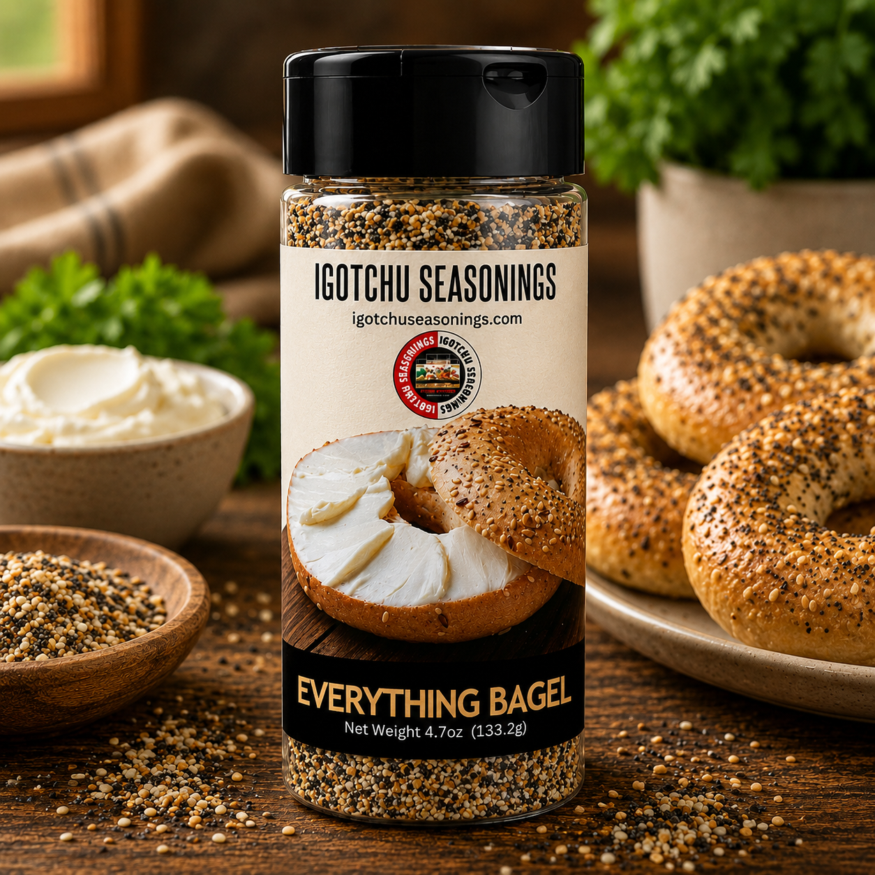 Igotchu Seasonings Everything Bagel seasoning blend in a jar, featuring sesame seeds, poppy seeds, garlic, and onion flakes.