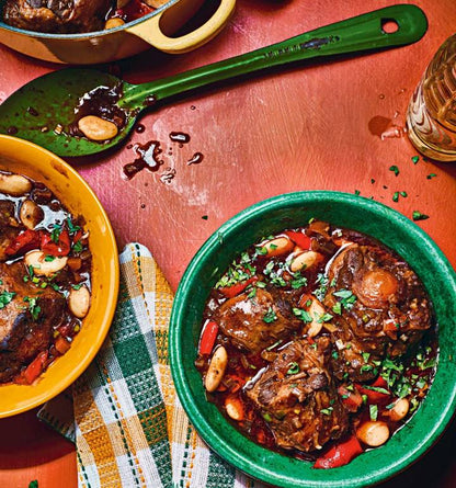 Igotchu Oxtail seasoning jar with labeled spice mix for flavorful oxtail dishes, shown in a close-up image.