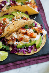 Freshly seasoned seafood dish featuring Igotchu Seafood Seasoning, showcasing vibrant spices on grilled seafood.