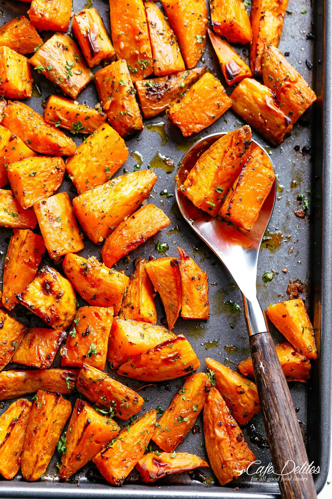 Igotchu Sweet Potato seasoning in a jar, showcasing vibrant orange spice blend for sweet potato dishes and seasoning.